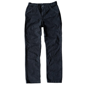 A pair of black chino work uniform pants with visible front button and zipper, and side pockets.
